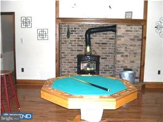4 Highpoint Road Perkasie, PA 18944 - Photo 8 of 12 a view of a fireplace with an empty room