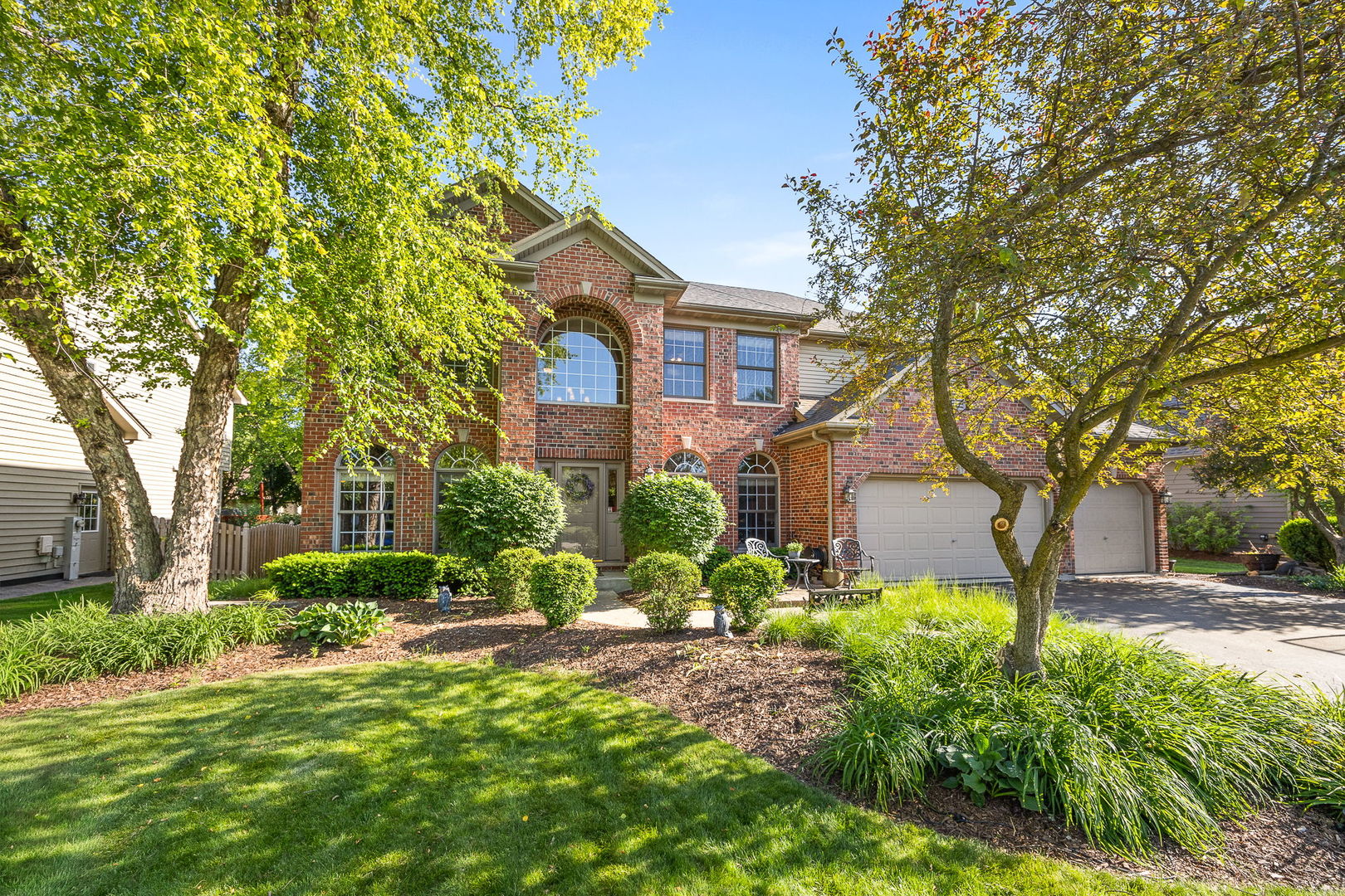 2816 Cordgrass Road Naperville, IL 60564 - Photo 1 of 49 a front view of a house with garden