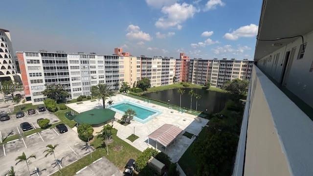 1780 Northeast 191st Street, Unit 8112 Miami, FL 33179 - Photo 23 of 24 a view of swimming pool with outdoor seating