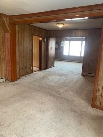 27 Fulton Street Fall River, MA 02720 - Photo 19 of 41 a view of an empty room and a window