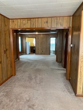 27 Fulton Street Fall River, MA 02720 - Photo 20 of 41 a view of a hallway with wooden shelves
