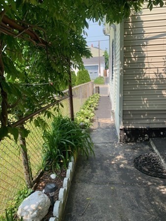 27 Fulton Street Fall River, MA 02720 - Photo 2 of 41 a view of a pathway of a house