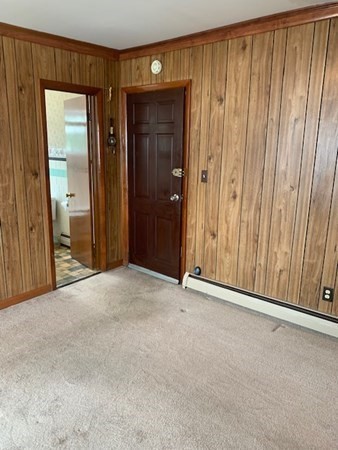 27 Fulton Street Fall River, MA 02720 - Photo 21 of 41 a view of an empty room with wooden door