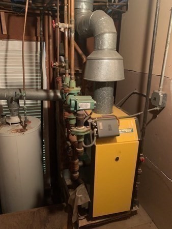 27 Fulton Street Fall River, MA 02720 - Photo 41 of 41 a close view of water heater room