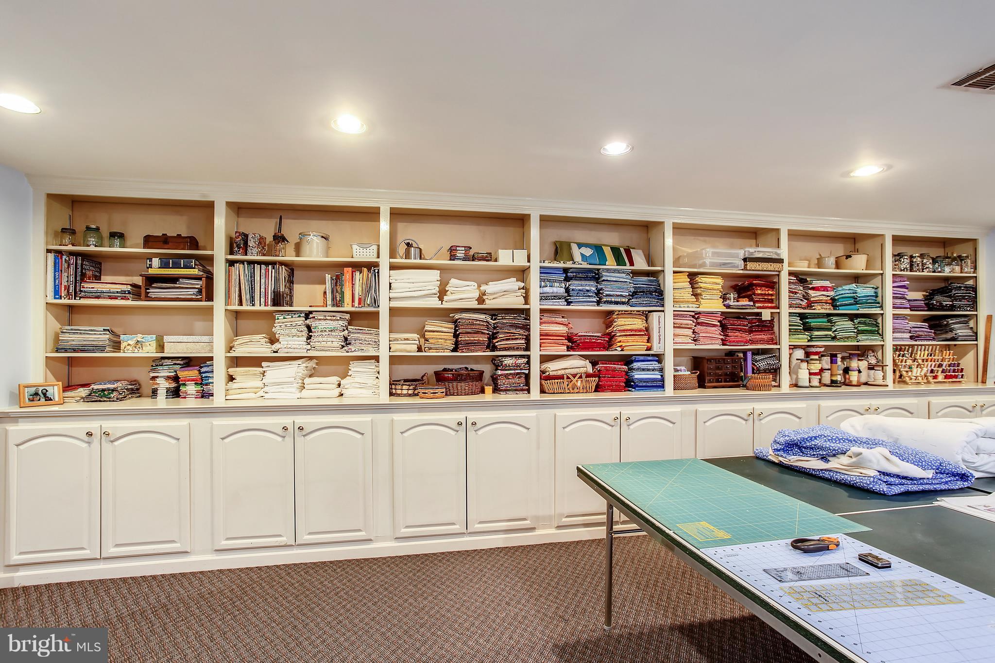 11887 Fawn Ridge Lane Reston, VA 20194 - Photo 23 of 27 Another wall of built in shelving and cabinetry