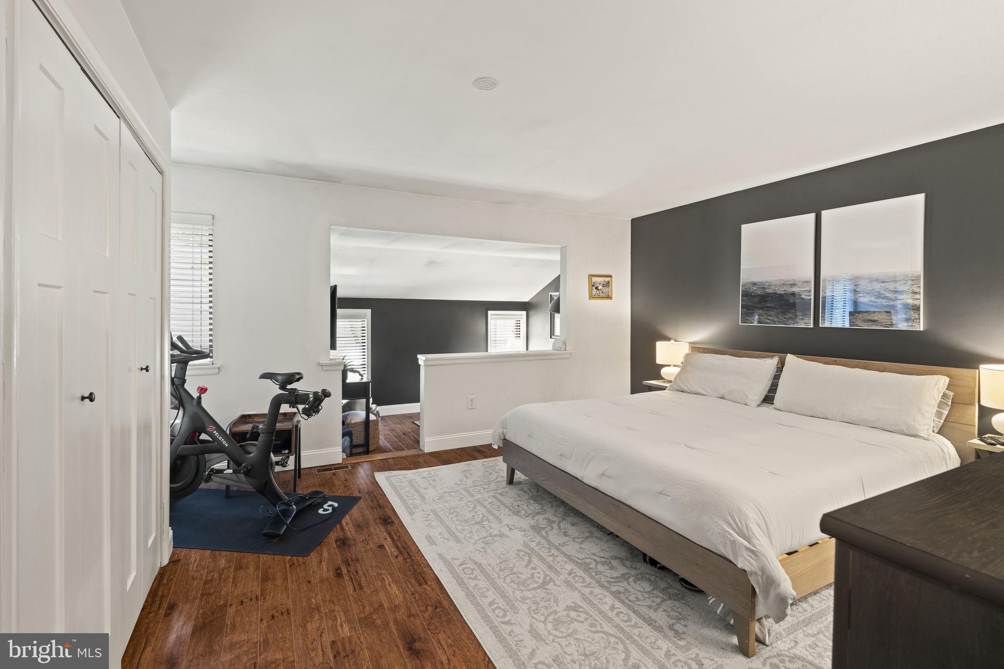 3508 San Rafael Court Springfield, PA 19064 - Photo 12 of 22 a bedroom with a bed and wooden floor