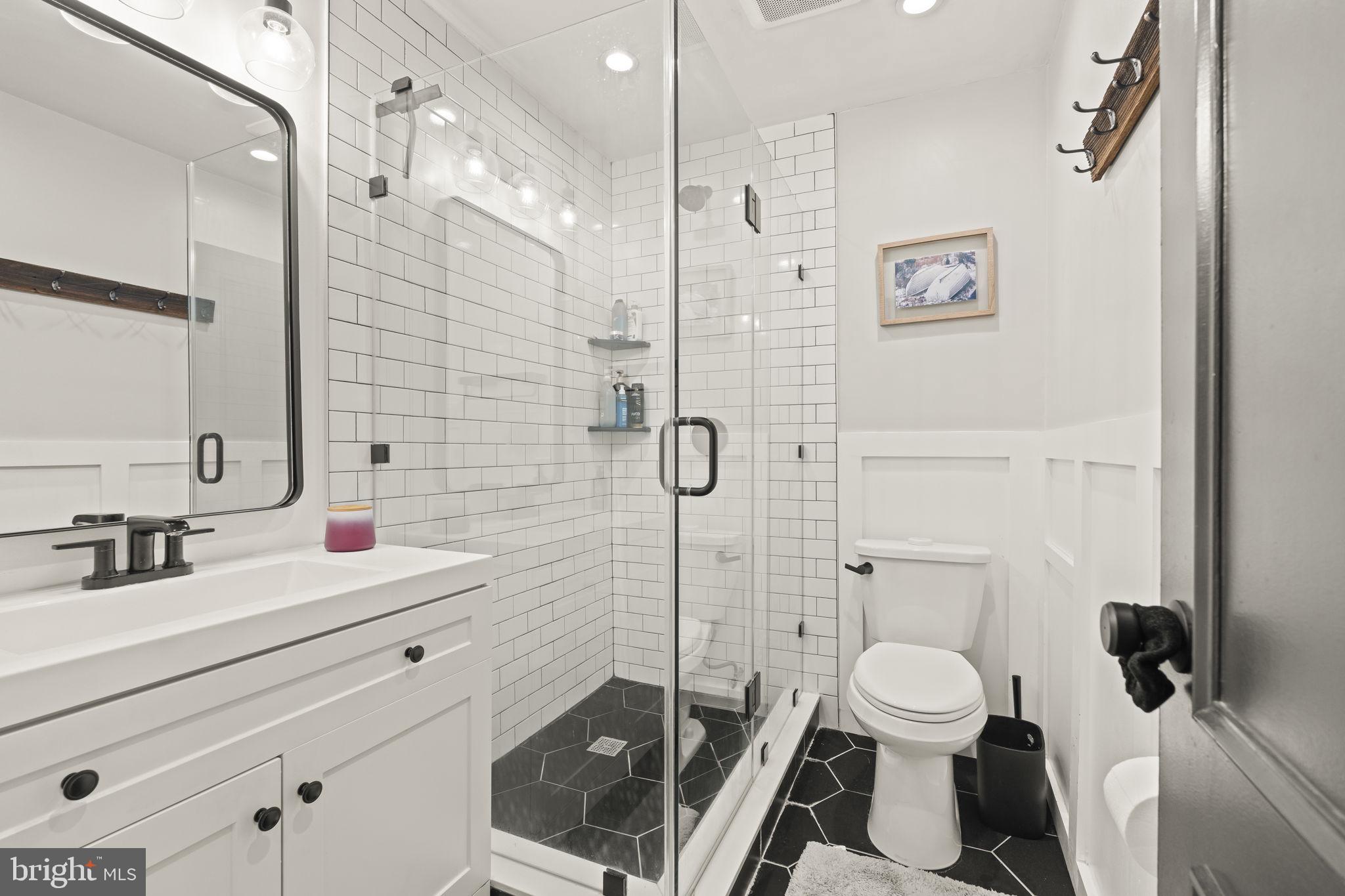 3508 San Rafael Court Springfield, PA 19064 - Photo 15 of 22 a bathroom with a sink a toilet and shower