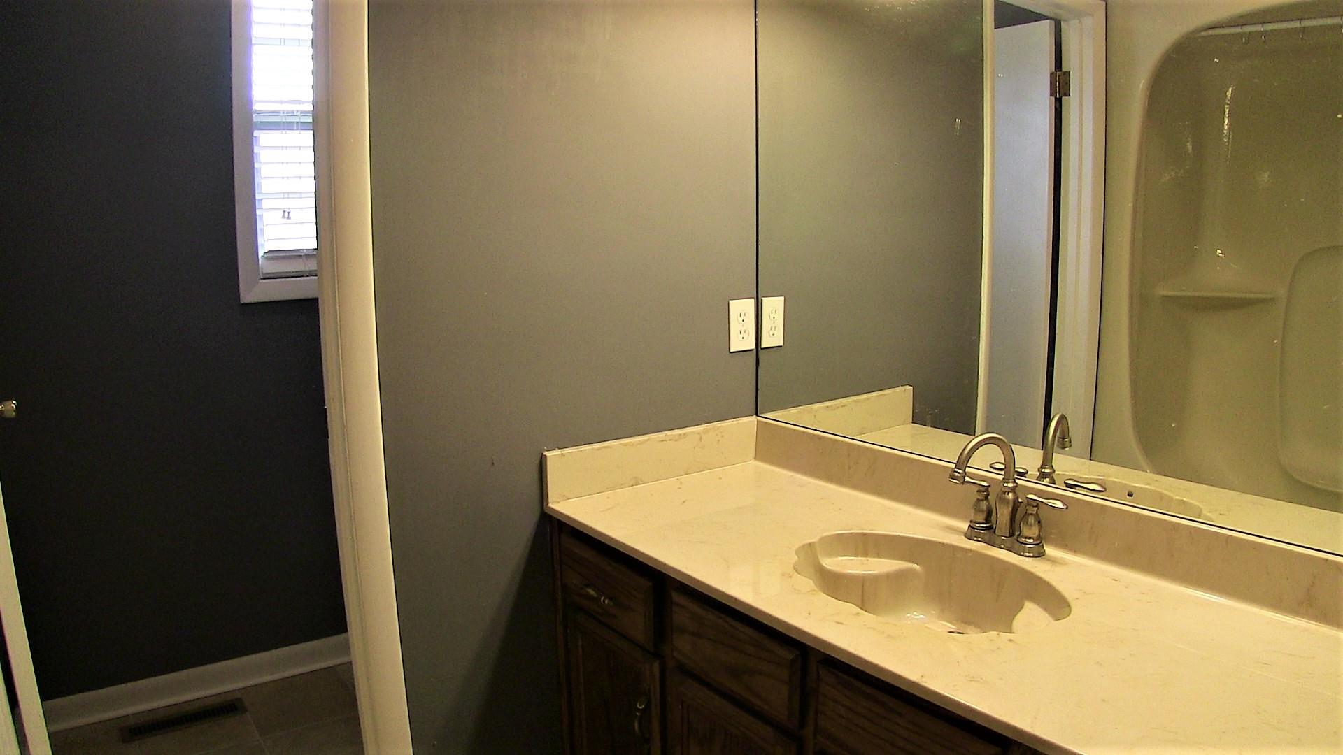 2680 Old Murfreesboro Road West Lebanon, TN 37090 - Photo 17 of 30 The second full bathroom also has a single vanity and shower tub combo