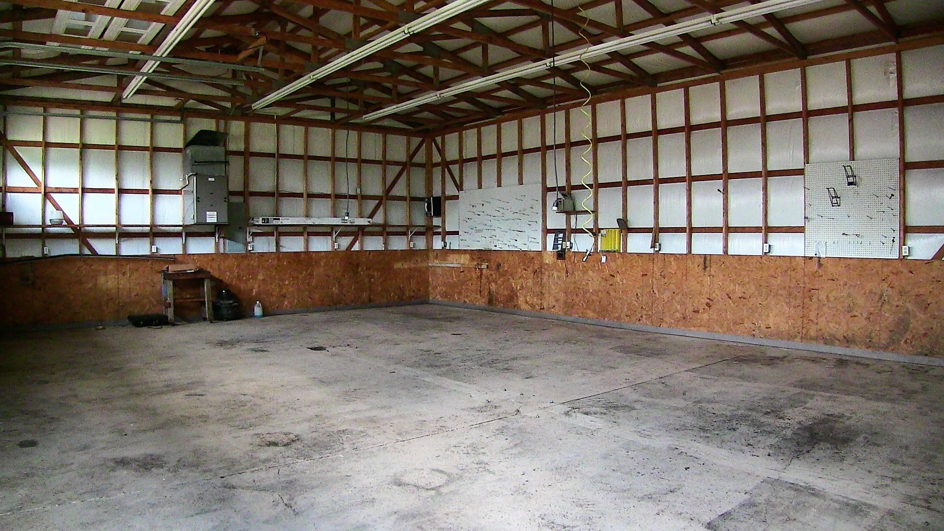 2680 Old Murfreesboro Road West Lebanon, TN 37090 - Photo 22 of 30 The detached shop has three large doors and a walk through door