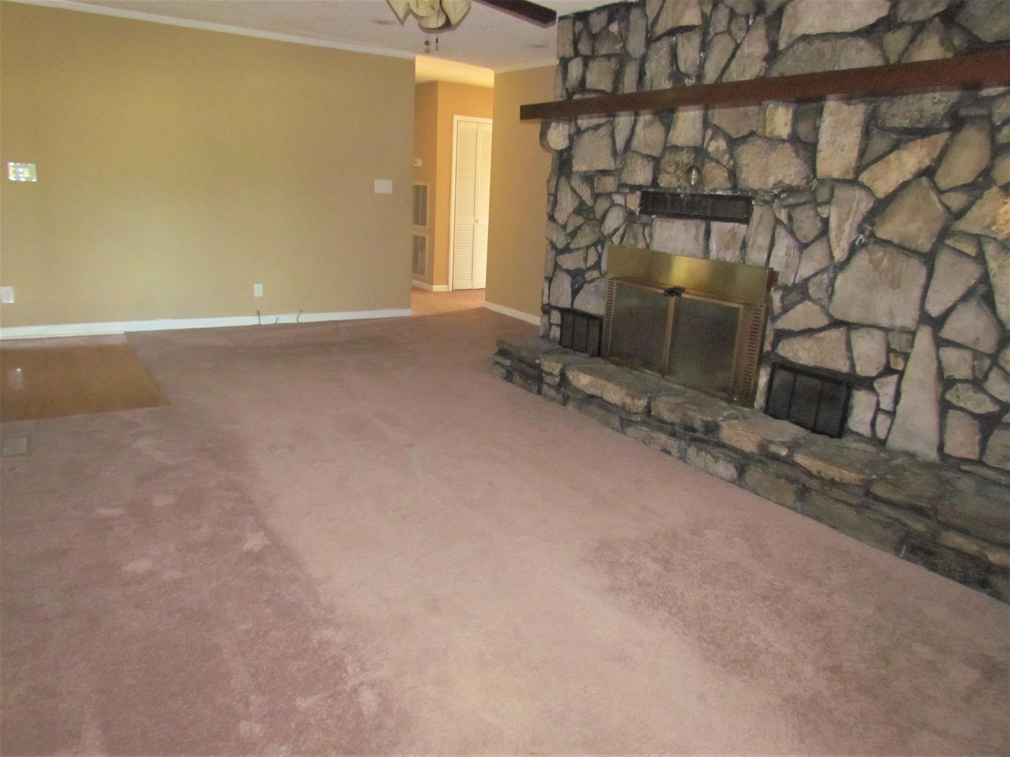 2680 Old Murfreesboro Road West Lebanon, TN 37090 - Photo 4 of 30 The separate den also has a floor to ceiling rock fireplace. There is also a door in the den leading to the Sunroom