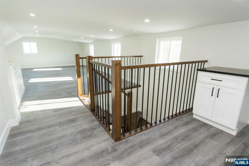 17 Warren Street, Unit 2 Bergenfield, NJ 07621 - Photo 21 of 28 a view of a hallway with wooden floor and windows