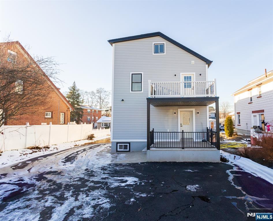 17 Warren Street, Unit 2 Bergenfield, NJ 07621 - Photo 26 of 28 a view of a house with a patio