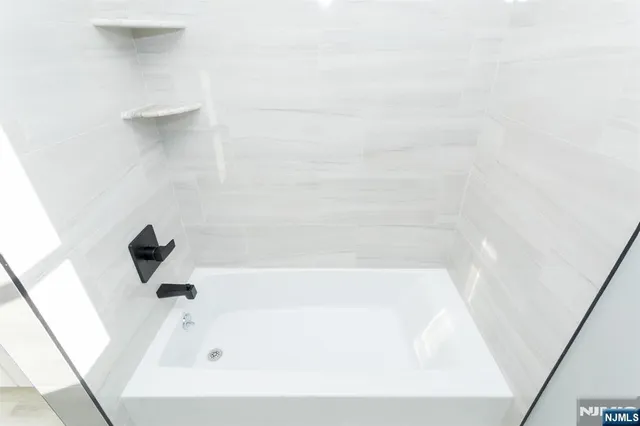 a bathroom with a bathtub