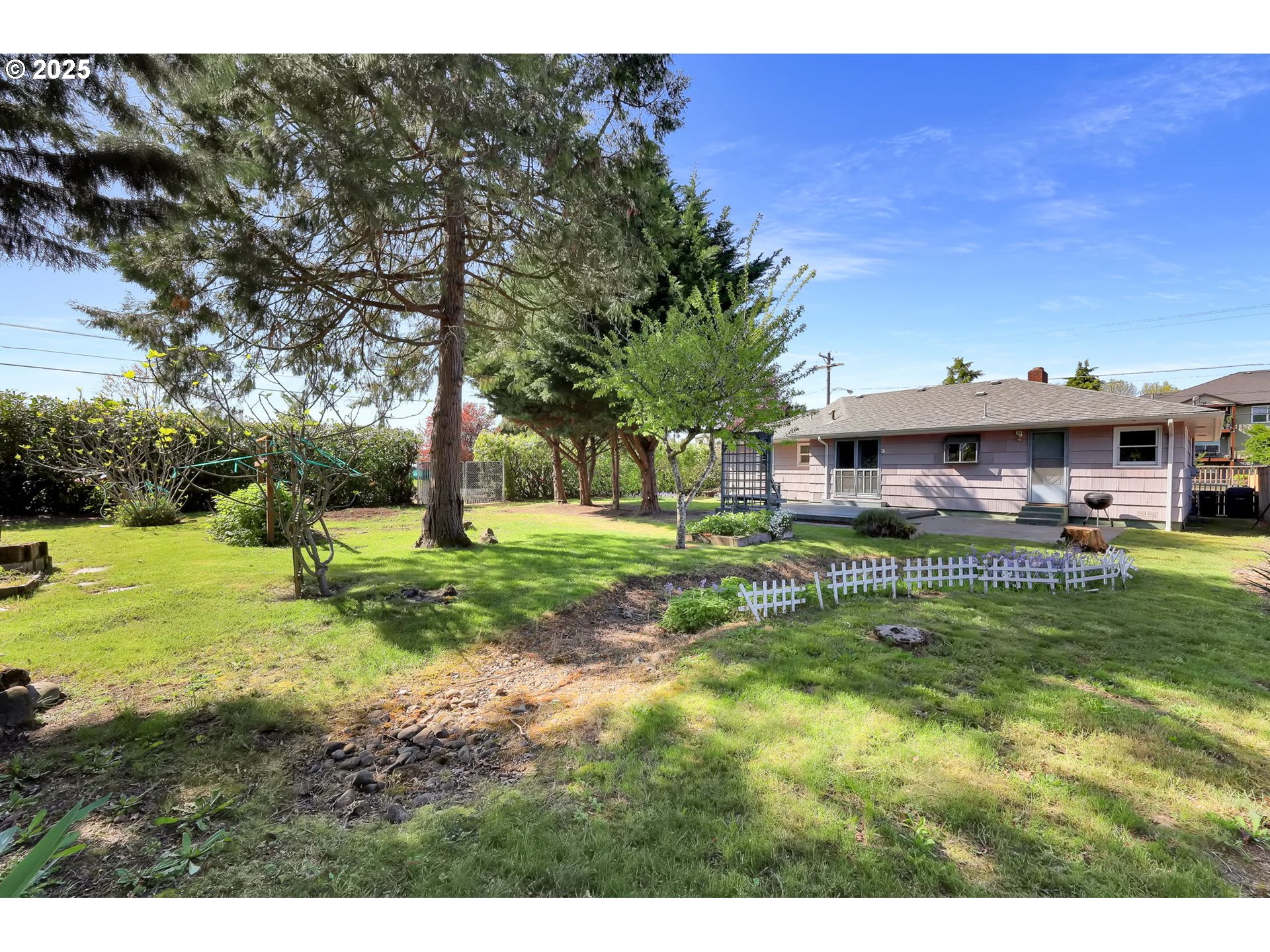 4150 Barger Drive Eugene, OR 97402 - Photo 23 of 28 a view of an house with backyard space and balcony