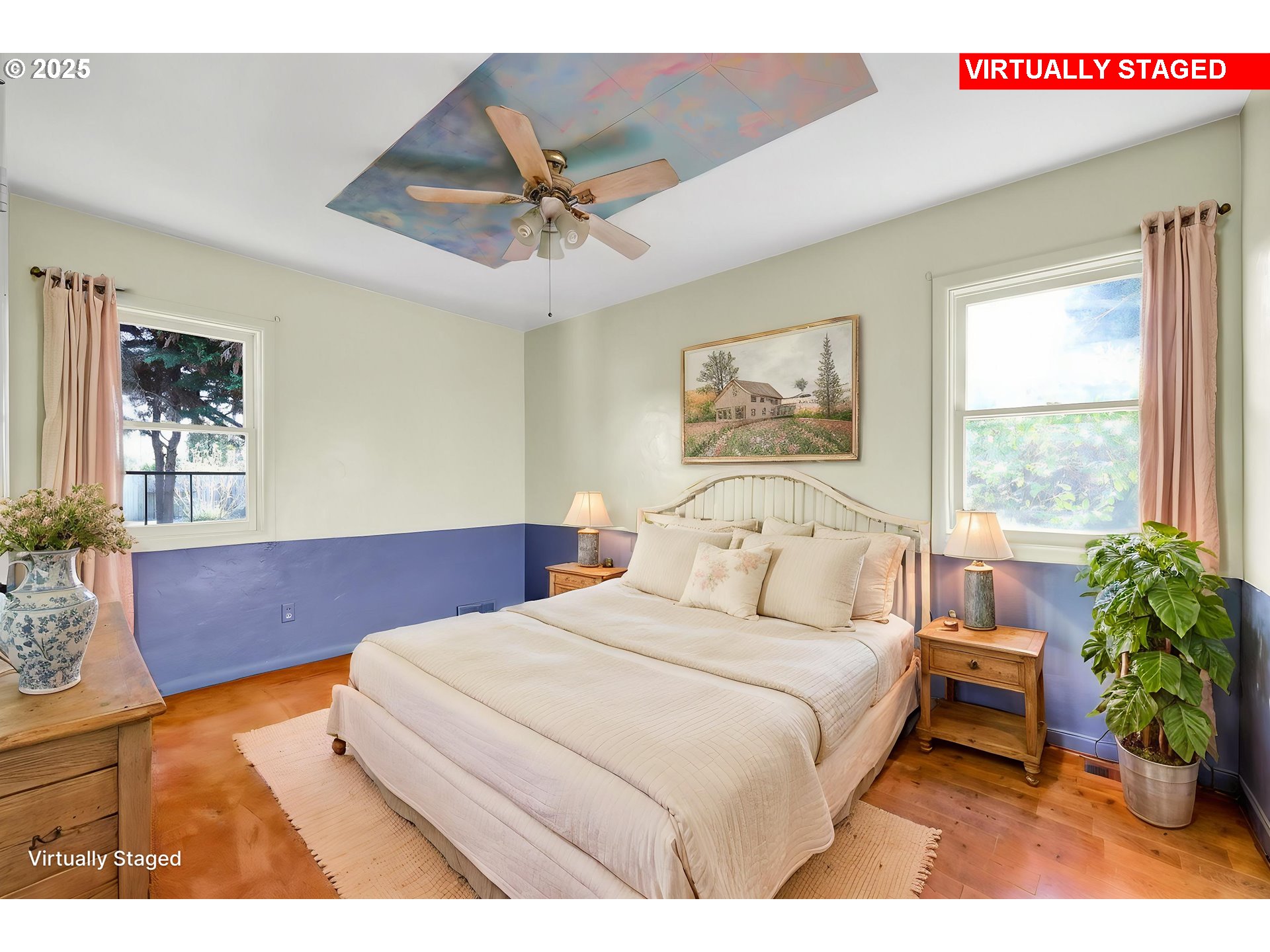 4150 Barger Drive Eugene, OR 97402 - Photo 27 of 28 a bedroom with a large bed and a chandelier