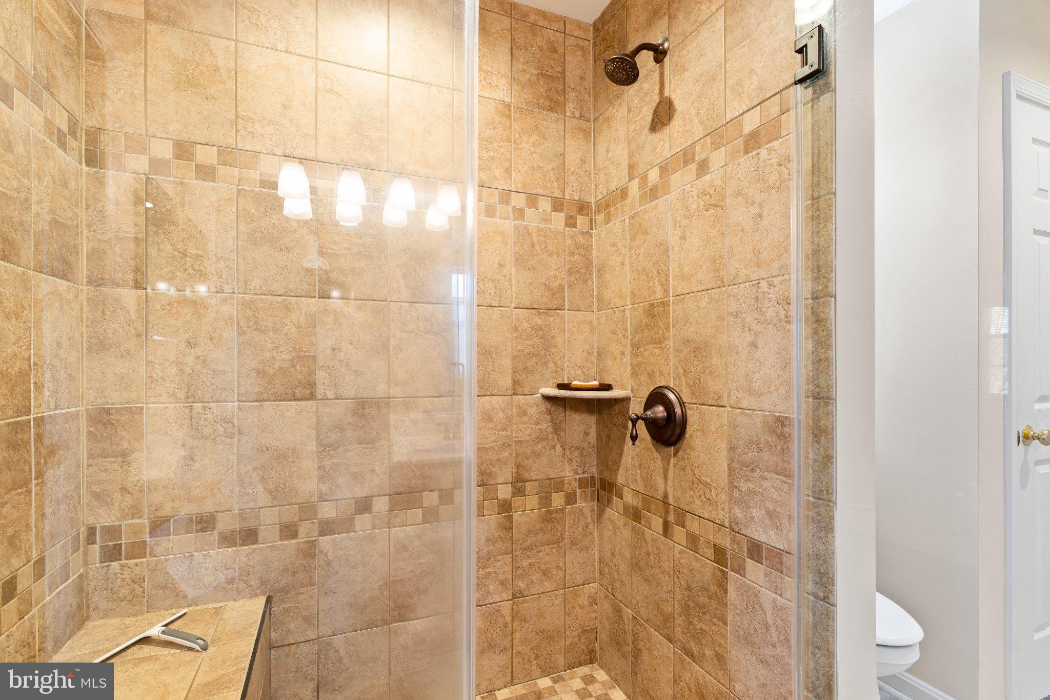 16 Ches Haven Road Earleville, MD 21919 - Photo 23 of 36 Elegant tiled shower with modern finishes en suite
