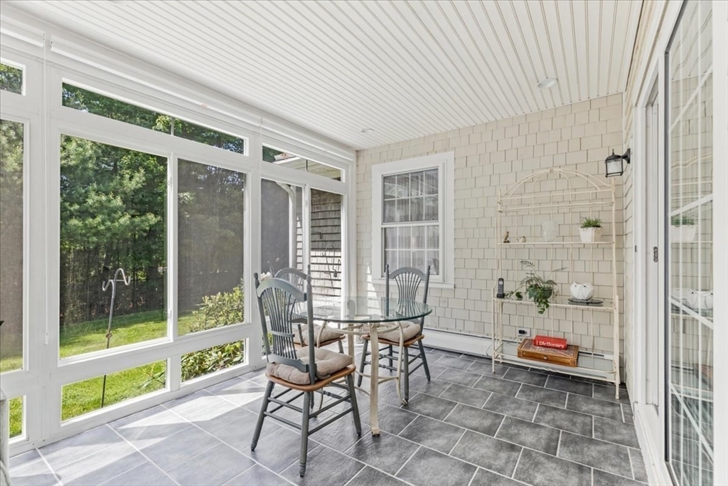 39 Waterfall Road Acushnet, MA 02743 - Photo 17 of 32 a dining room with furniture and front door