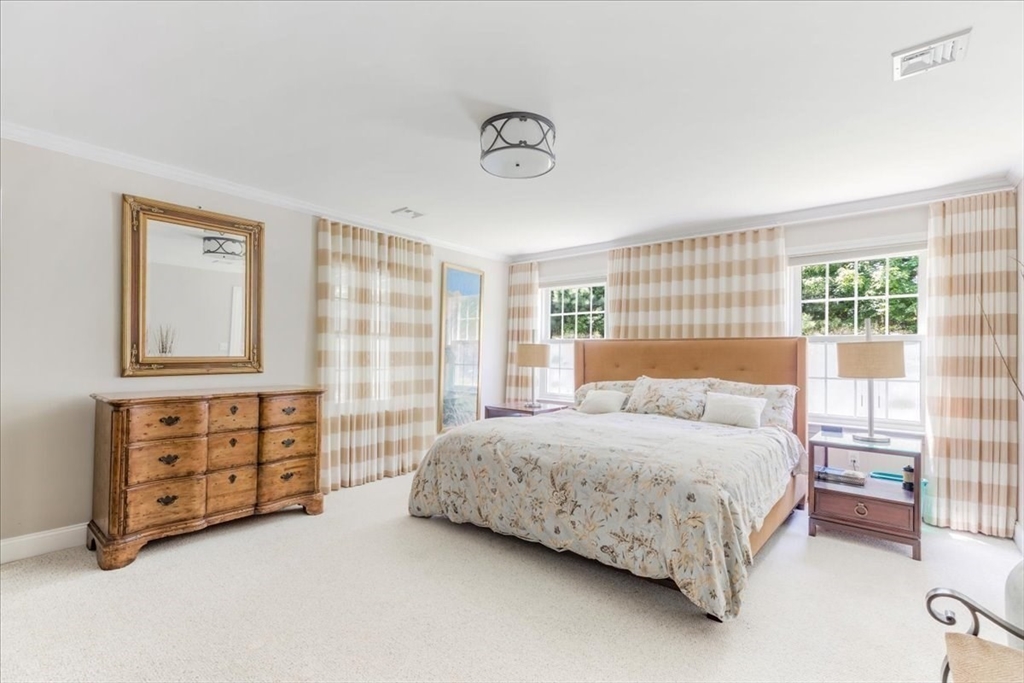 39 Waterfall Road Acushnet, MA 02743 - Photo 19 of 32 a bedroom with a bed dresser and a window