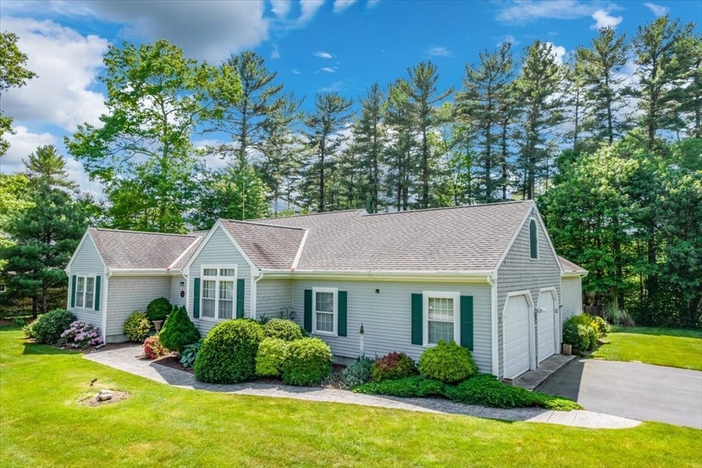 39 Waterfall Road Acushnet, MA 02743 - Photo 2 of 32 a aerial view of a house with swimming pool next to a yard