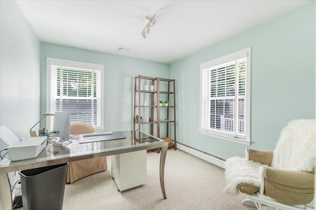 39 Waterfall Road Acushnet, MA 02743 - Photo 23 of 32 a living room with furniture and windows