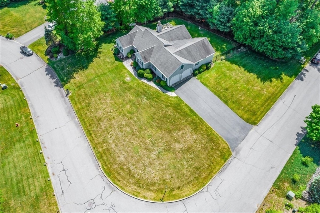 39 Waterfall Road Acushnet, MA 02743 - Photo 28 of 32 an aerial view of a house with swimming pool
