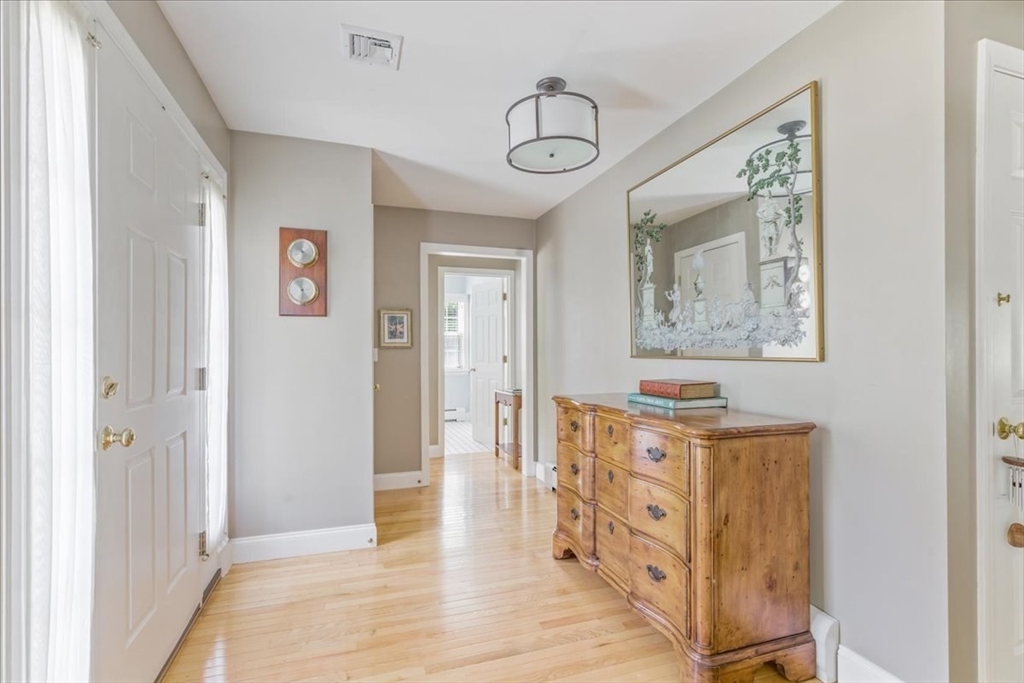 39 Waterfall Road Acushnet, MA 02743 - Photo 3 of 32 a view of a hallway to a livingroom with furniture