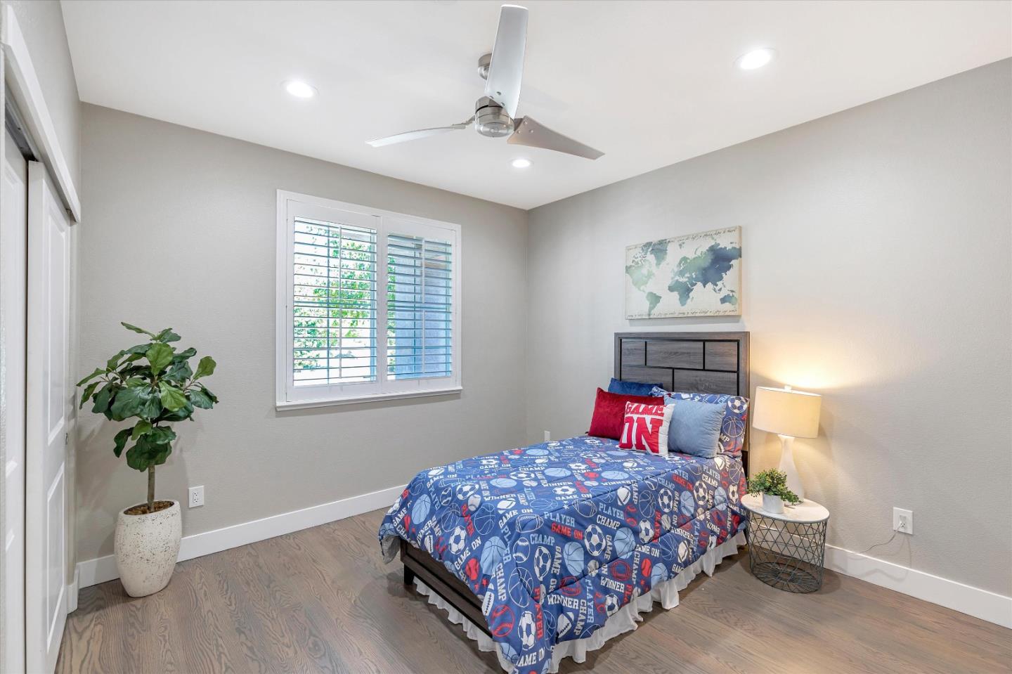 1106 Sprig Way Gilroy, CA 95020 - Photo 12 of 27 a bedroom with a bed and a potted plant