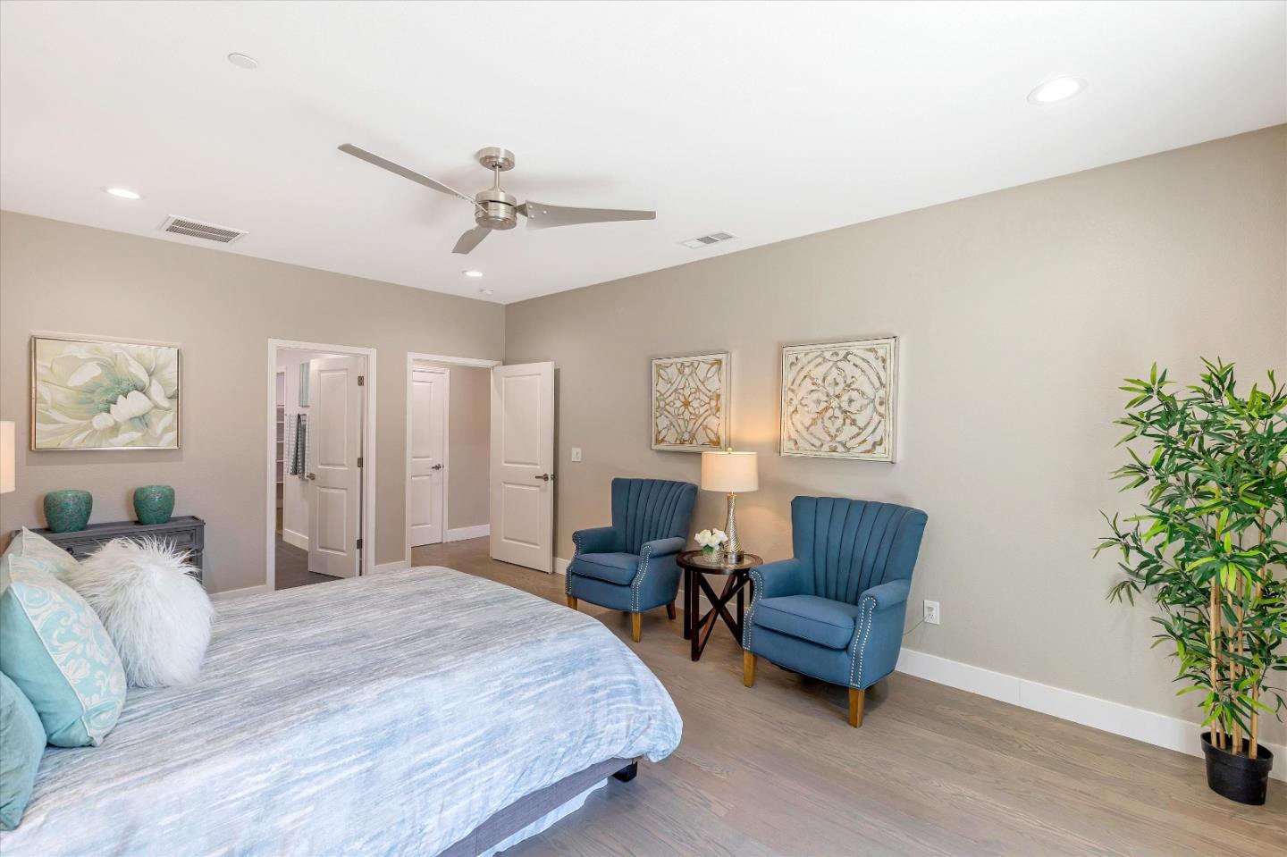 1106 Sprig Way Gilroy, CA 95020 - Photo 15 of 27 a bed room with a bed and a couch