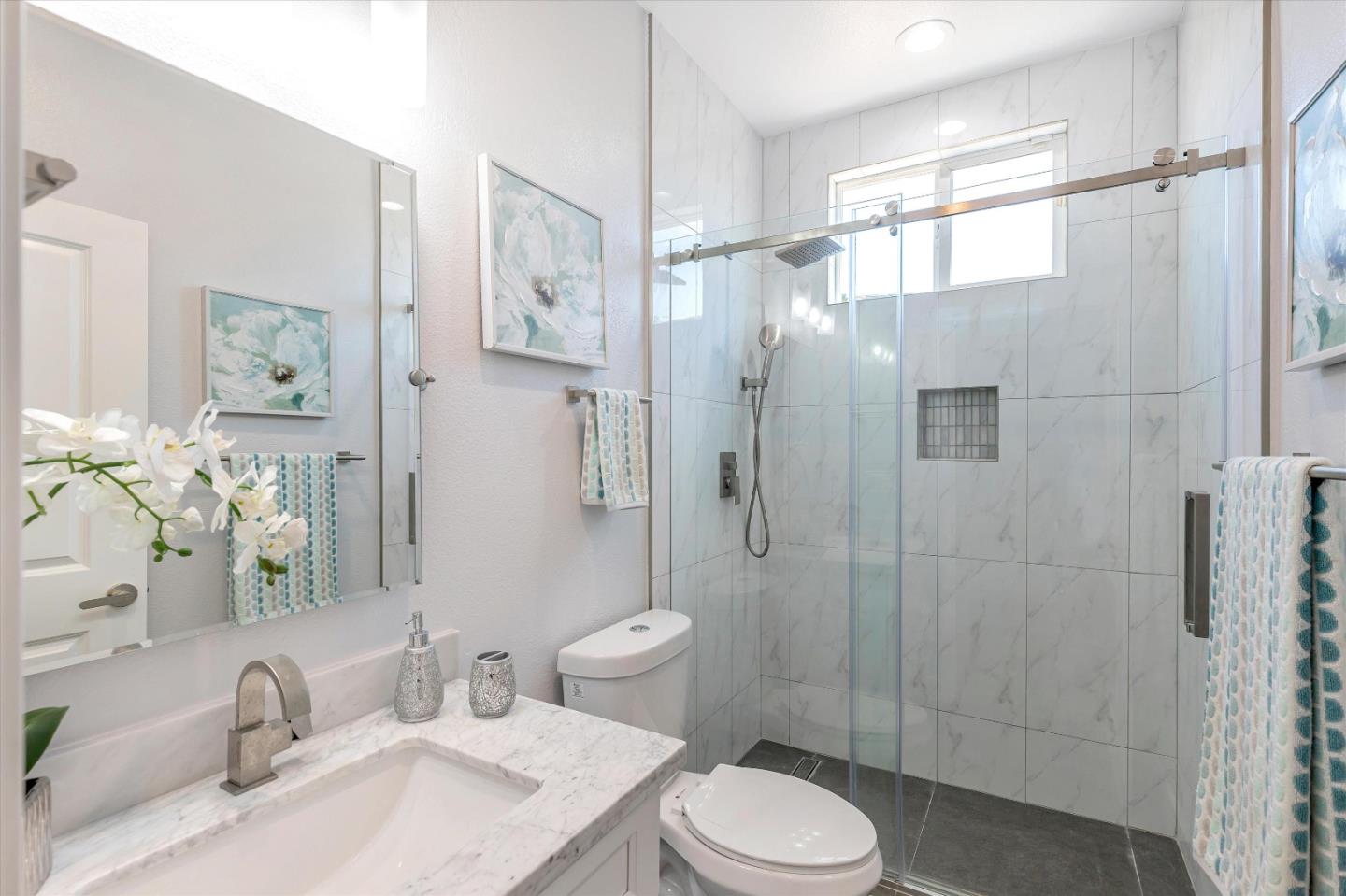 1106 Sprig Way Gilroy, CA 95020 - Photo 18 of 27 a bathroom with a sink toilet and shower