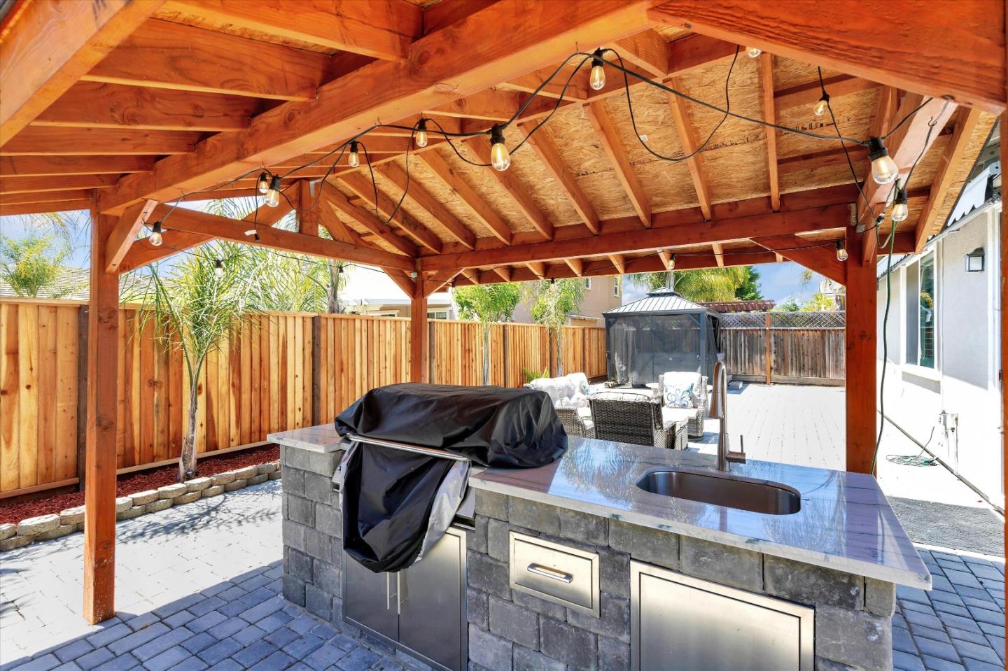 1106 Sprig Way Gilroy, CA 95020 - Photo 26 of 27 a view of patio with table and chairs