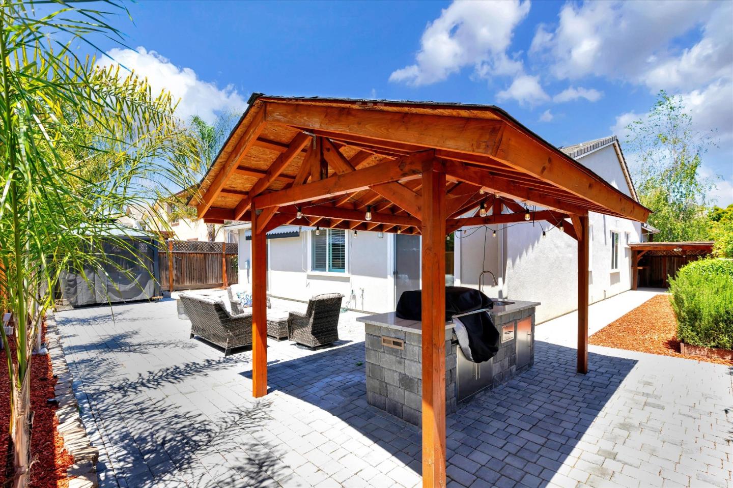 1106 Sprig Way Gilroy, CA 95020 - Photo 27 of 27 a backyard of a house with seating space