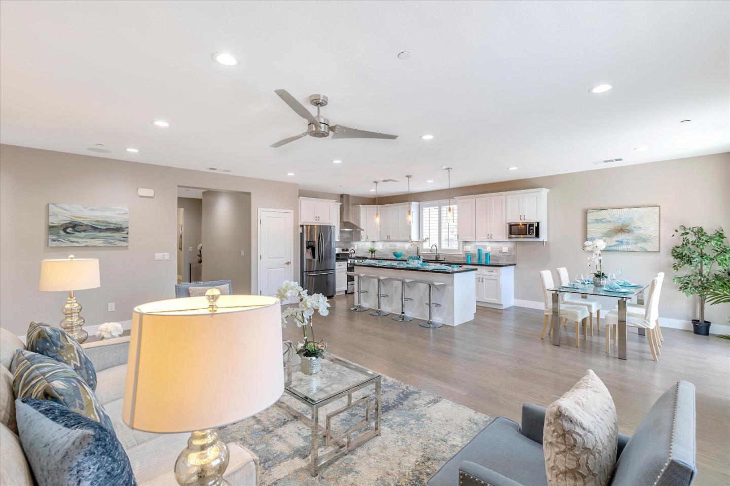 1106 Sprig Way Gilroy, CA 95020 - Photo 6 of 27 a living room with furniture and kitchen view