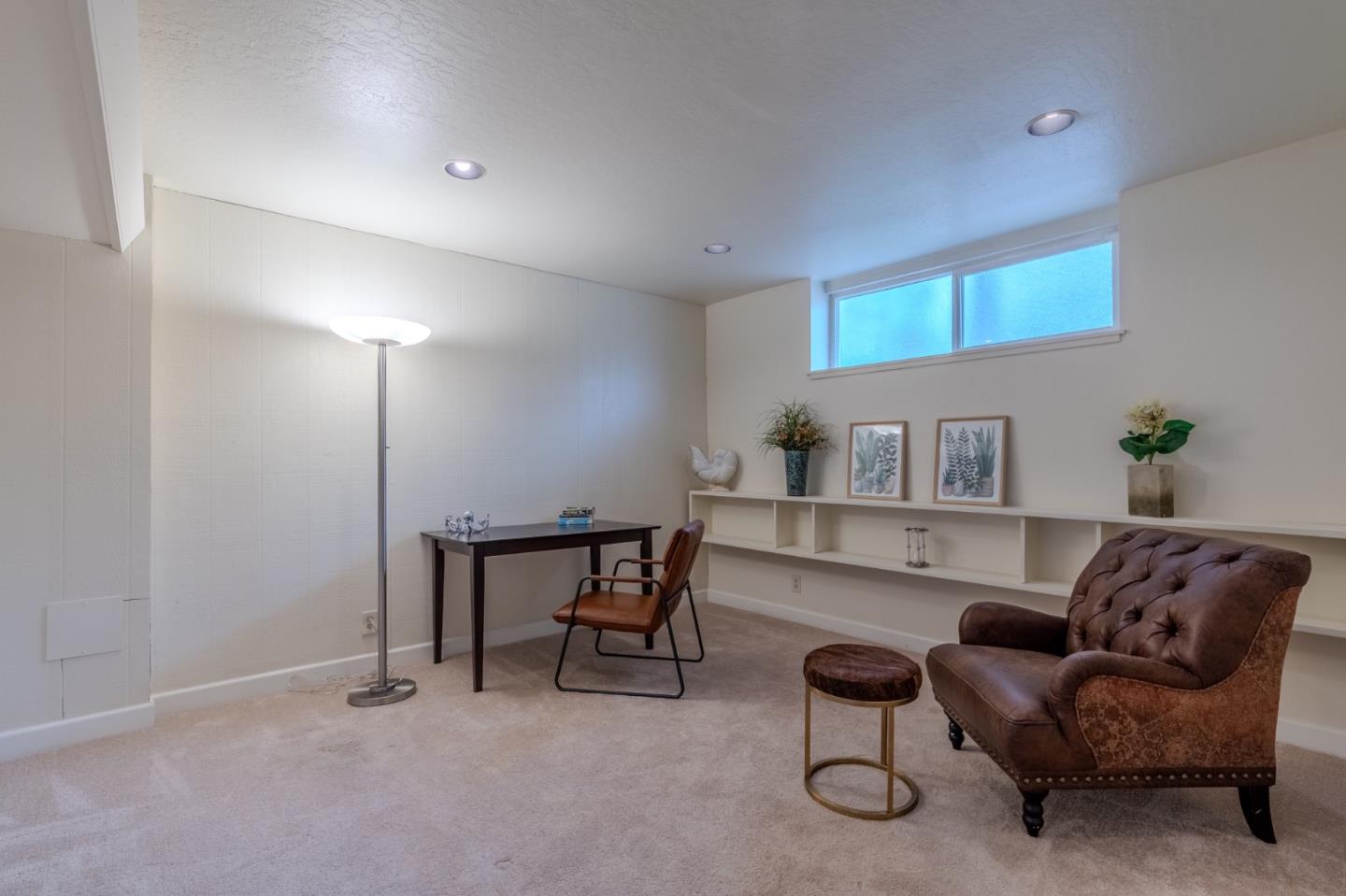 1031 Yosemite Drive Pacifica, CA 94044 - Photo 31 of 40 a livingroom with furniture and a potted plant