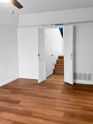 a bathroom with a sink a mirror and a toilet