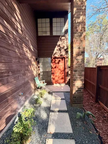 a bench sitting in front of a building