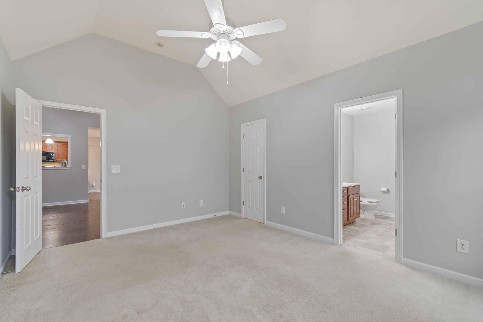 1112 Golf View Way Spring Hill, TN 37174 - Photo 26 of 47 a view of an empty room with a ceiling fan