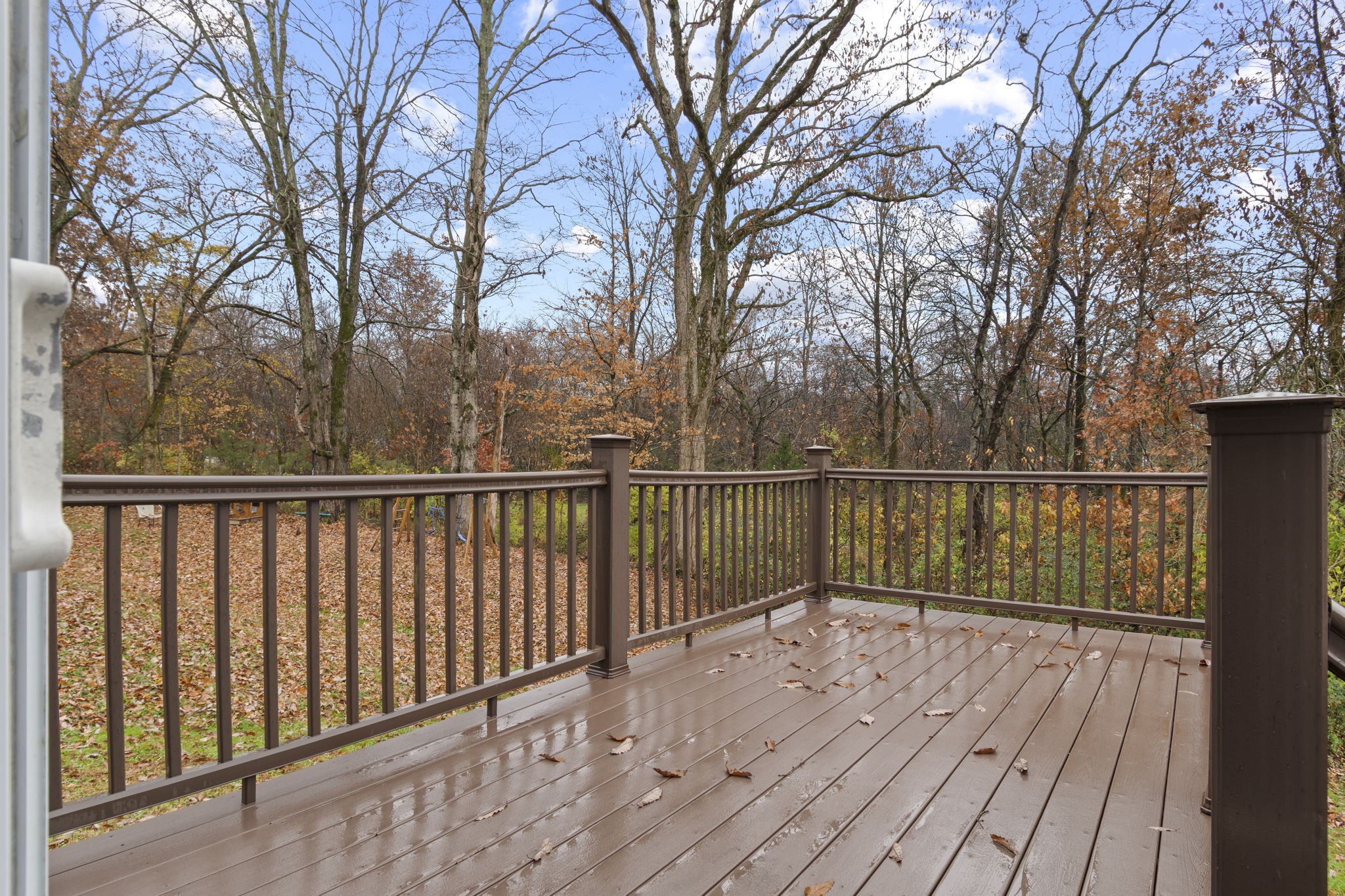 1112 Golf View Way Spring Hill, TN 37174 - Photo 41 of 47 a view of balcony with wooden floor and fence