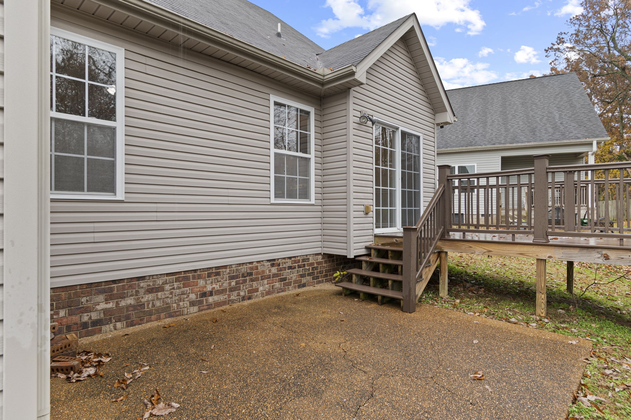 1112 Golf View Way Spring Hill, TN 37174 - Photo 43 of 47 a view of a patio with a table and chairs