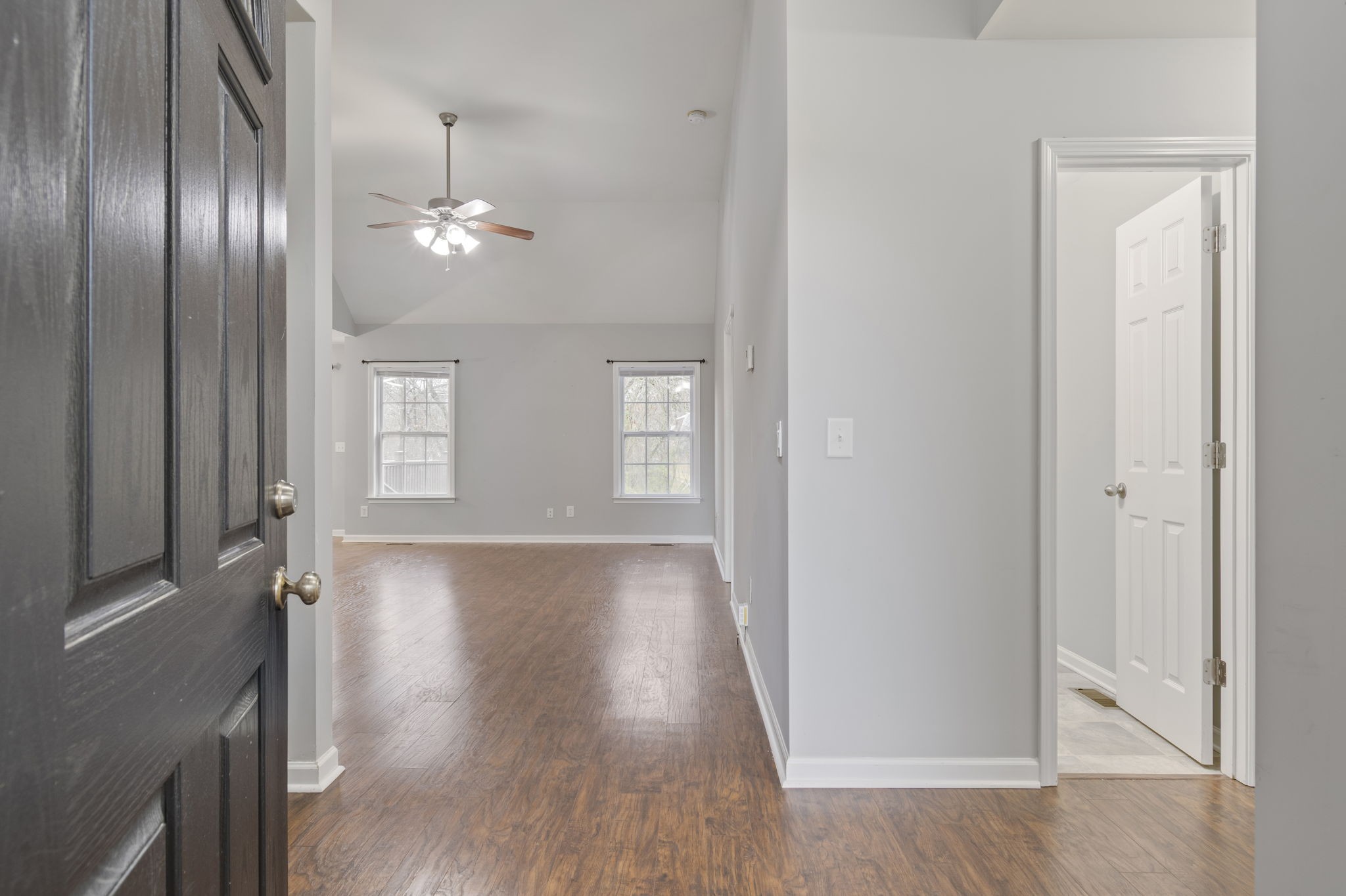 1112 Golf View Way Spring Hill, TN 37174 - Photo 5 of 47 wooden floor in an empty room with a window
