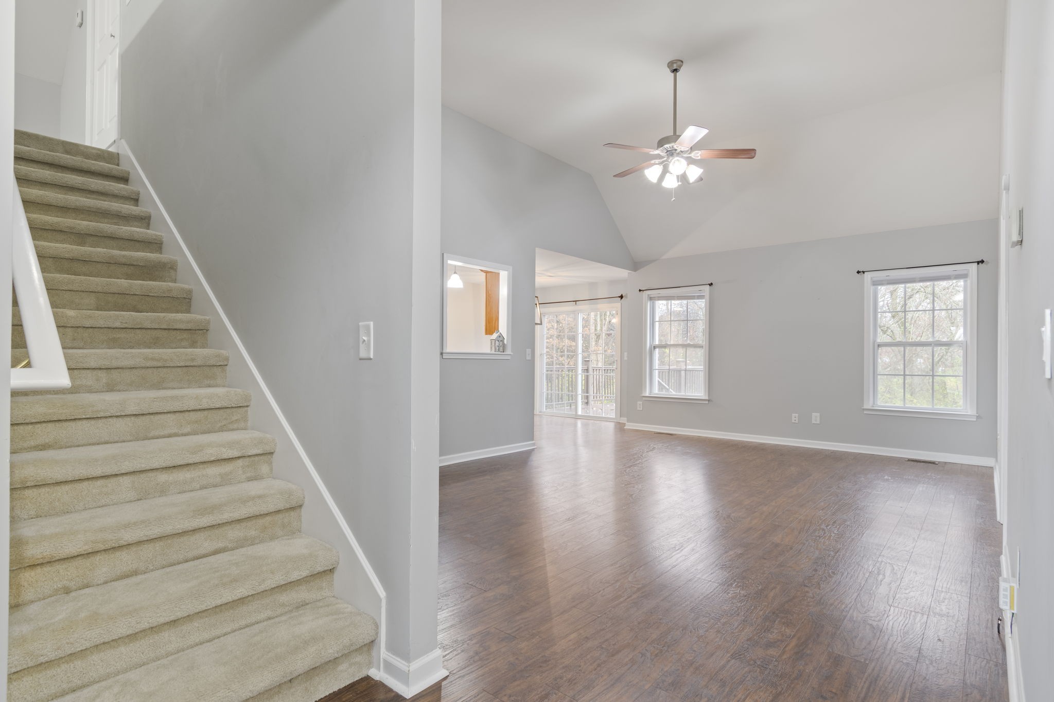 1112 Golf View Way Spring Hill, TN 37174 - Photo 7 of 47 a view of an entryway with wooden floor and stair