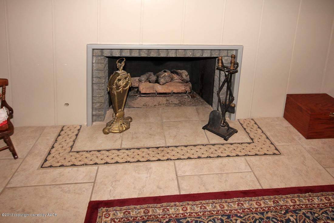 6209 Elmhurst Road Amarillo, TX 79106 - Photo 9 of 43 Living Area Fireplace with Tile Trim