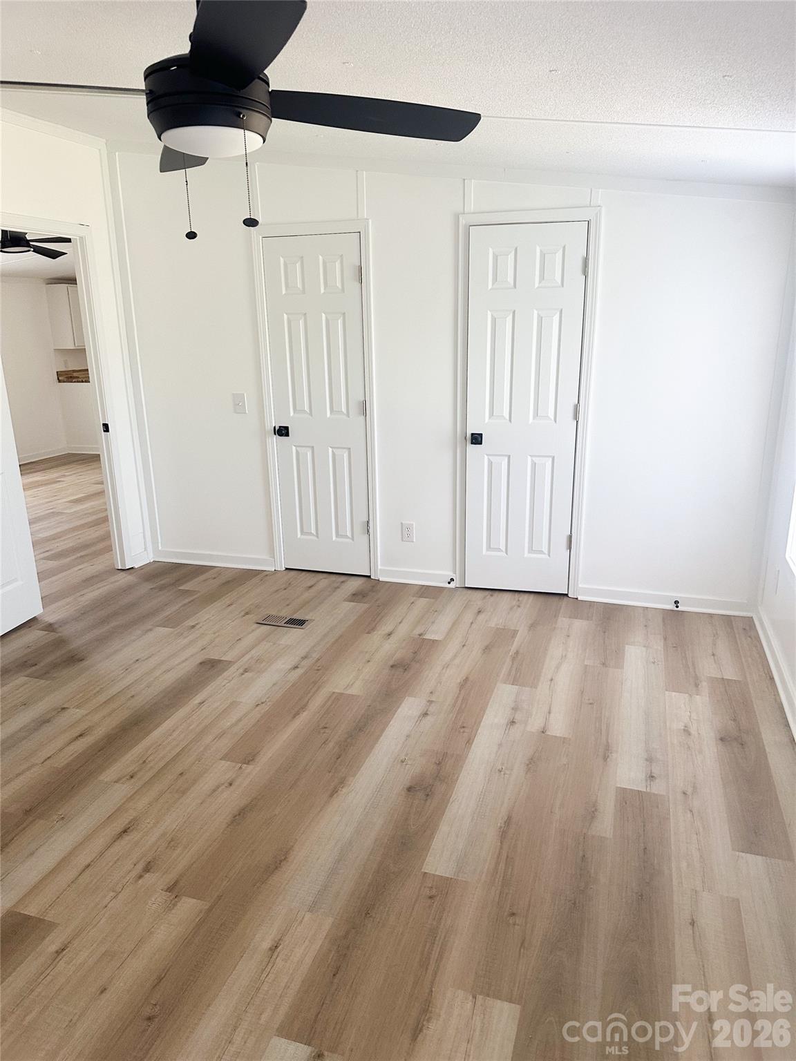 2976 Stephens Road Bethune, SC 29009 - Photo 18 of 24 a view of room with wooden floor