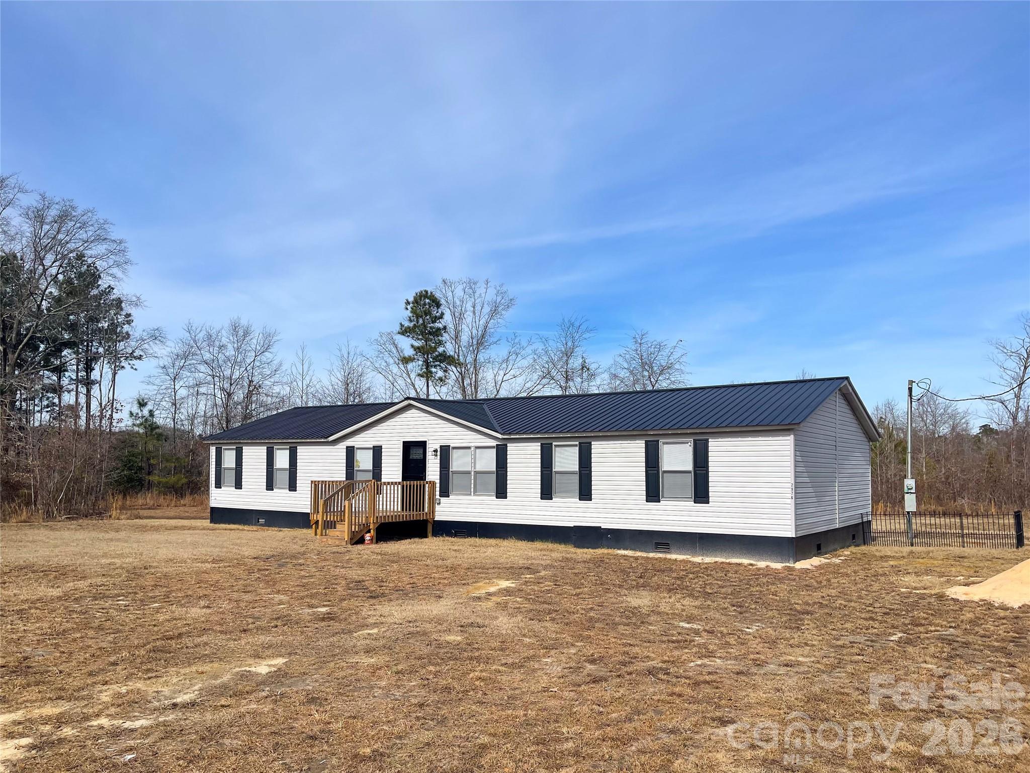 2976 Stephens Road Bethune, SC 29009 - Photo 2 of 24 a view of a house with a big yard