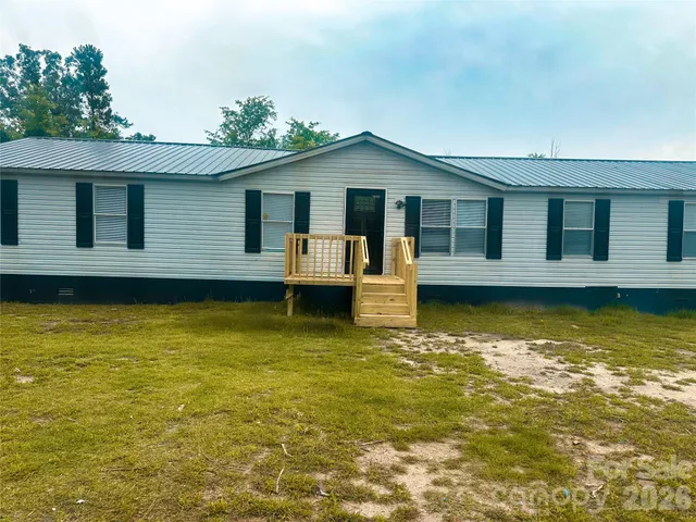 a view of a house with a swimming pool