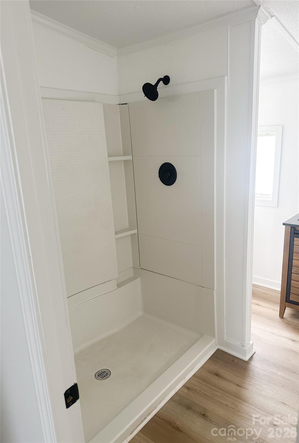 2976 Stephens Road Bethune, SC 29009 - Photo 24 of 24 a bathroom with a glass shower door