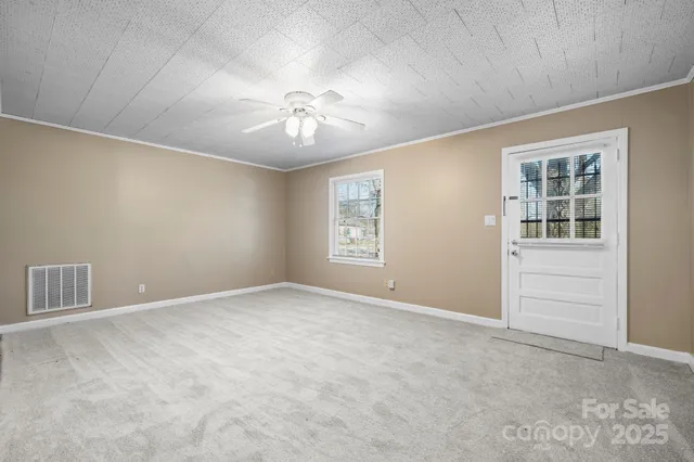 an empty room with windows