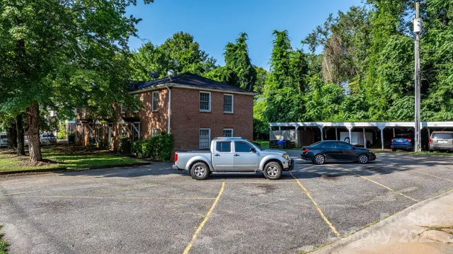 a car parked in front of a house