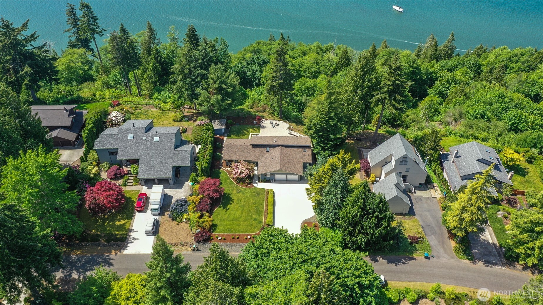 7713 78th Loop Northwest Olympia, WA 98502 - Photo 36 of 40 an aerial view of a house with a garden