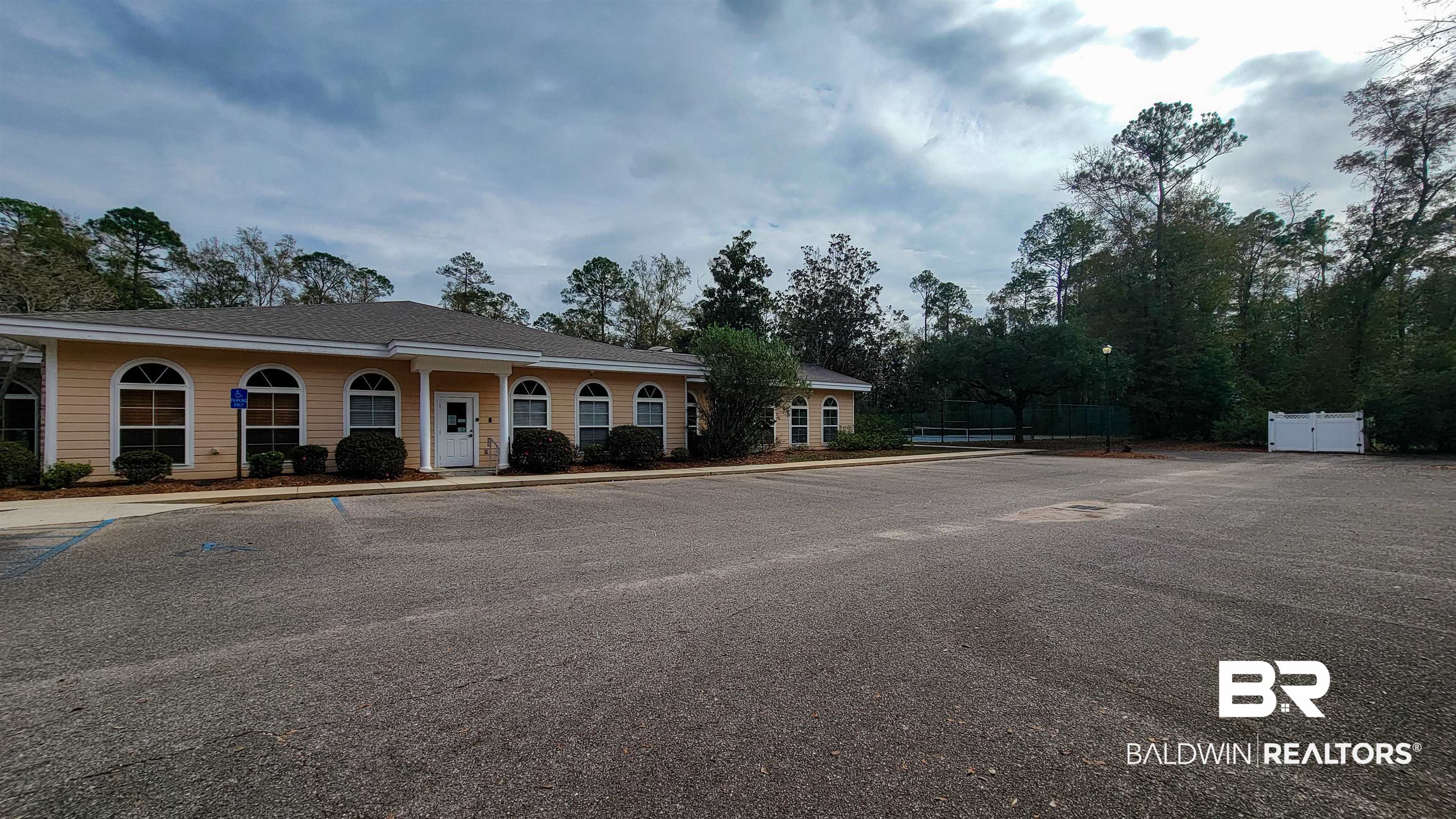 214 Hemingway Loop Foley, AL 36535 - Photo 54 of 67 View of building exterior with uncovered parking