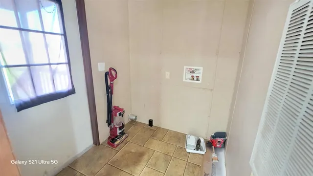 a view of storage and utility room